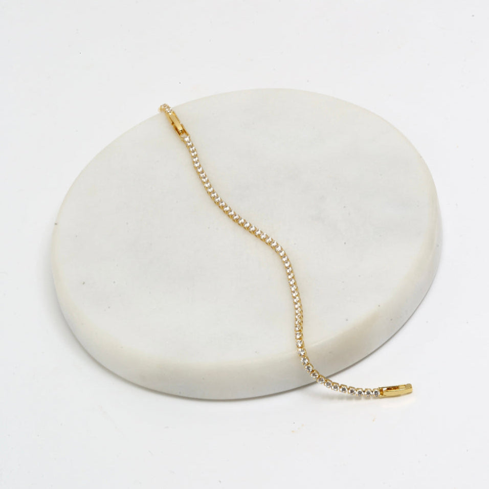 Thin round cut tennis bracelet