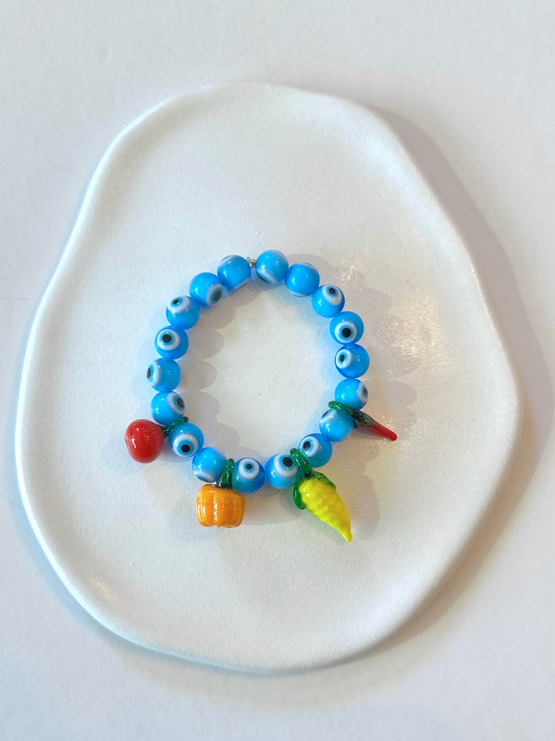 Glass fruits & evil eye bracelet
