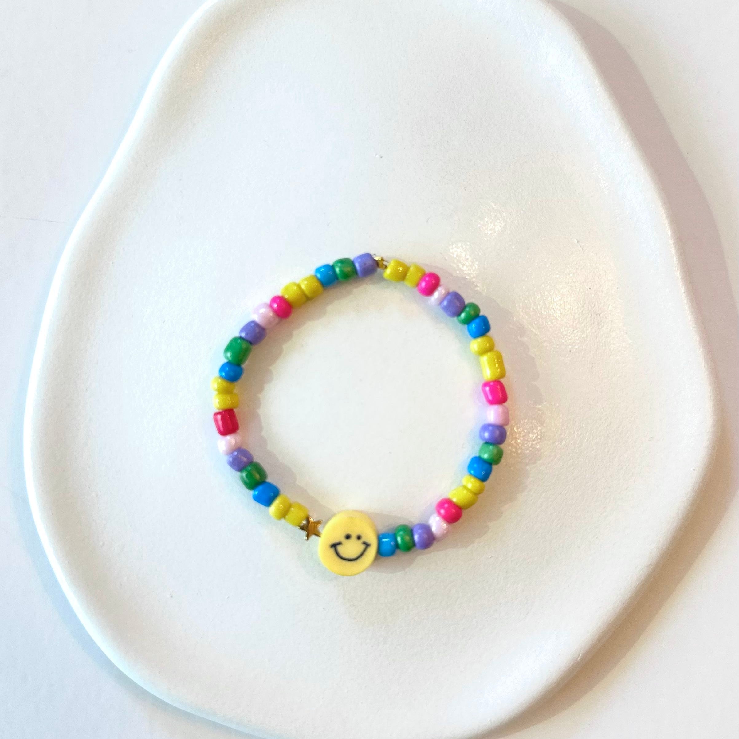 Yellow smiley bracelet