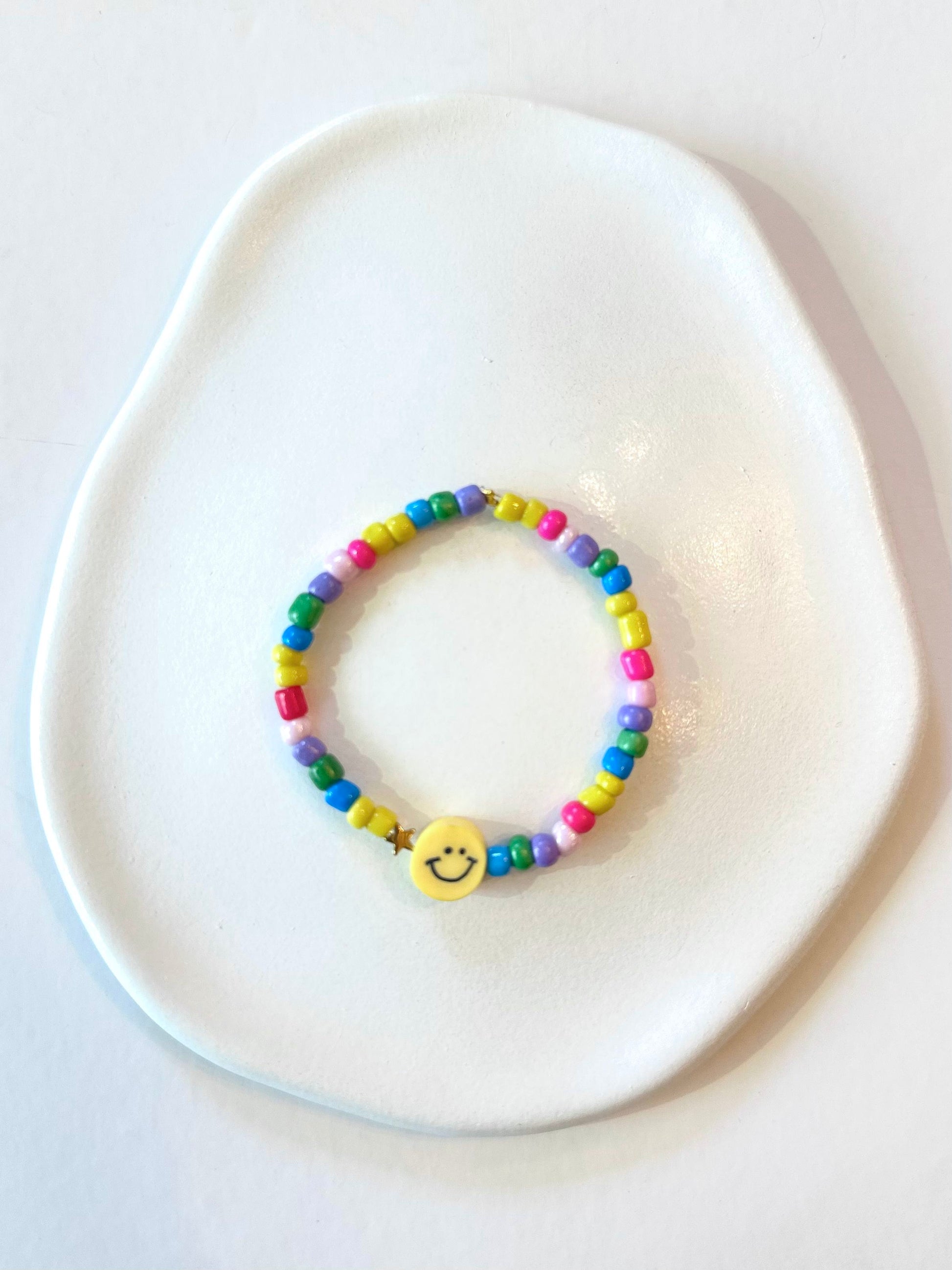 Yellow smiley bracelet
