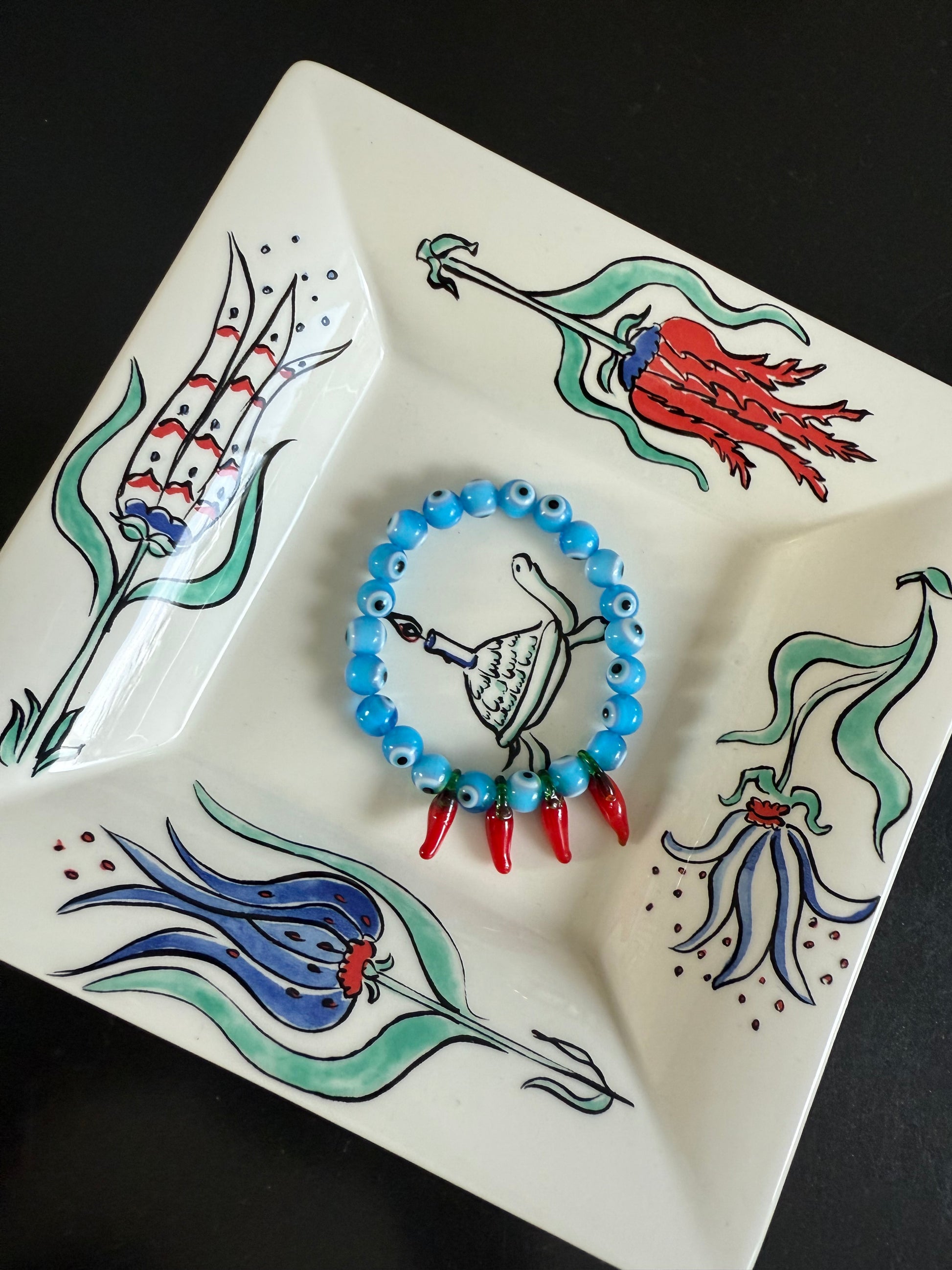 Protected red hot chilly bracelet