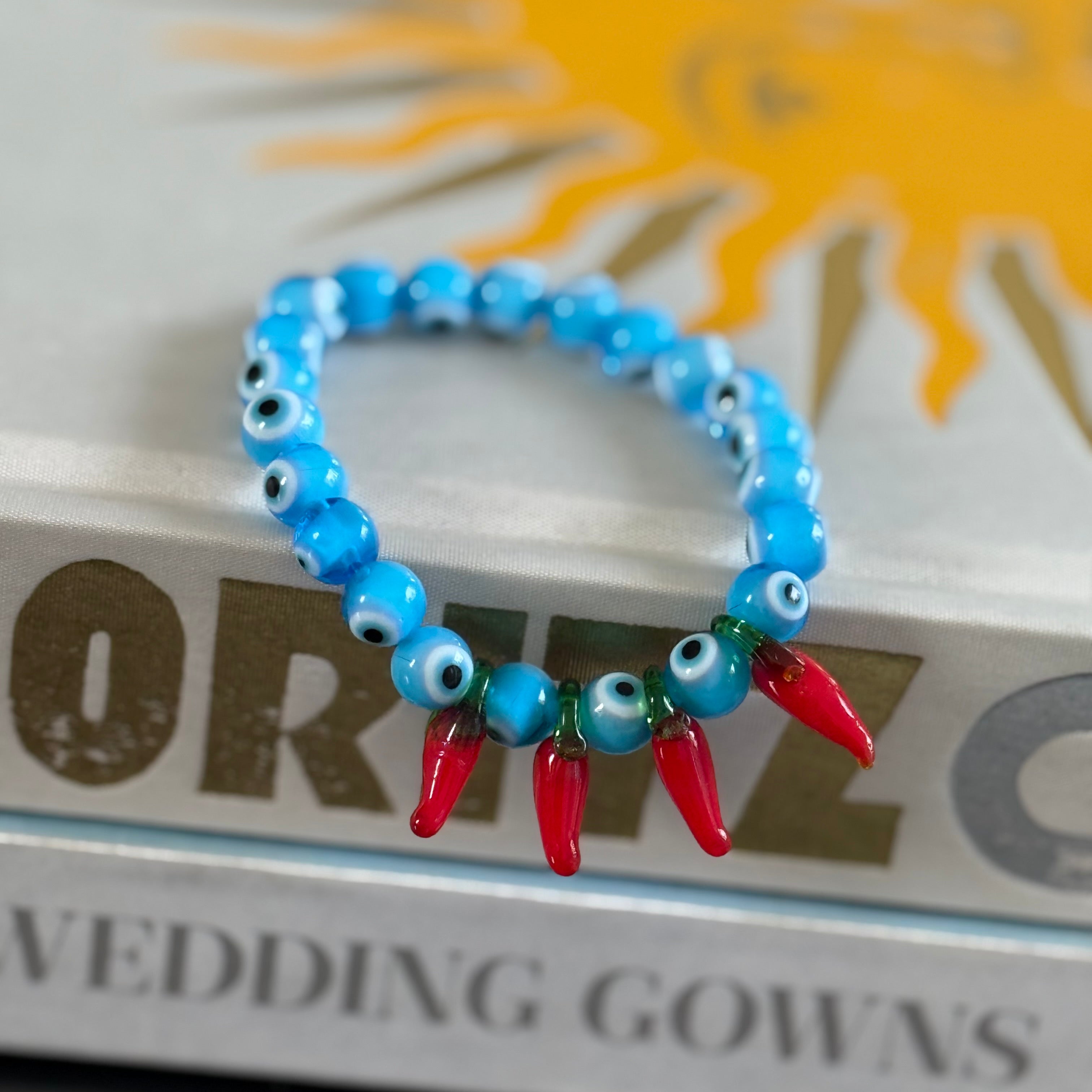 Protected red hot chilly bracelet
