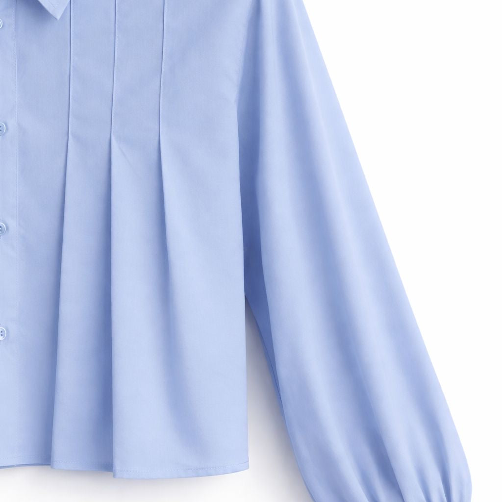 Blue shirt with pleat details