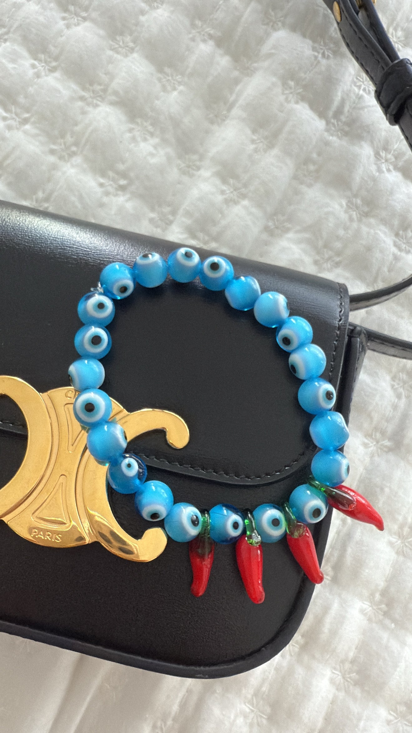 Protected red hot chilly bracelet