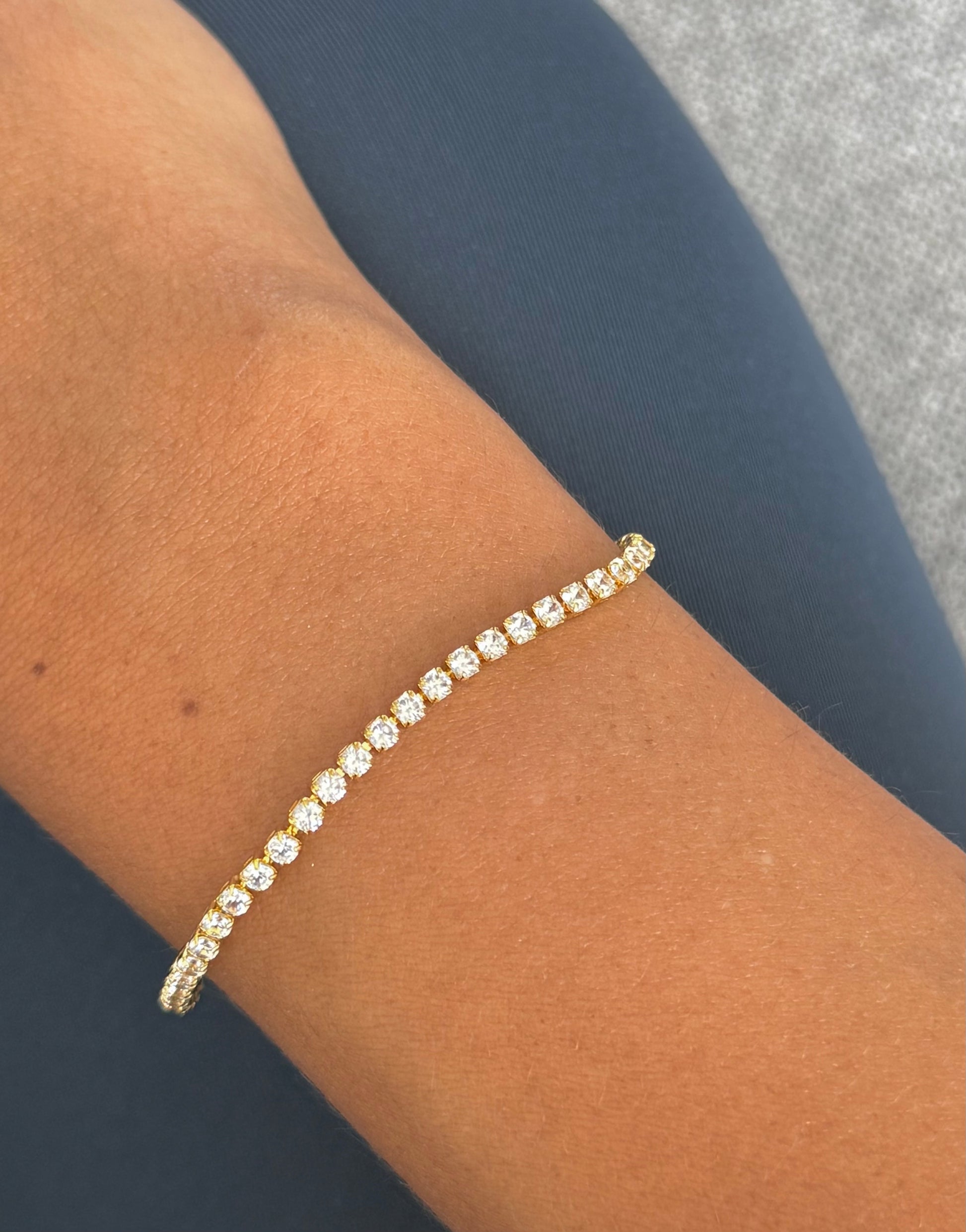 Thin round cut tennis bracelet
