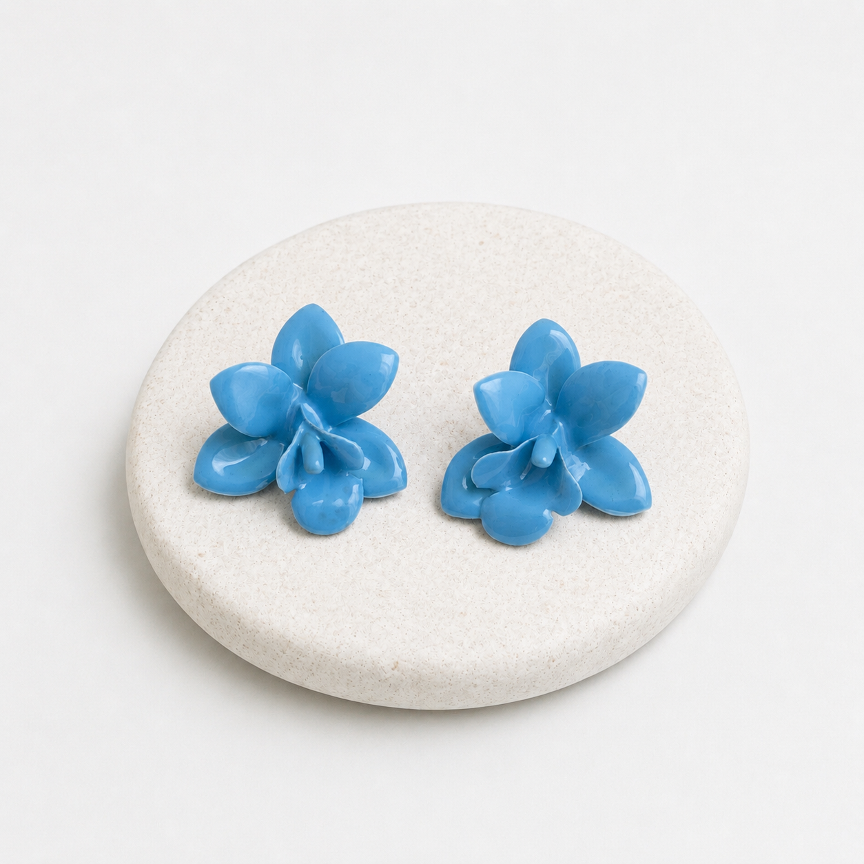 Blue orchid plastic earrings