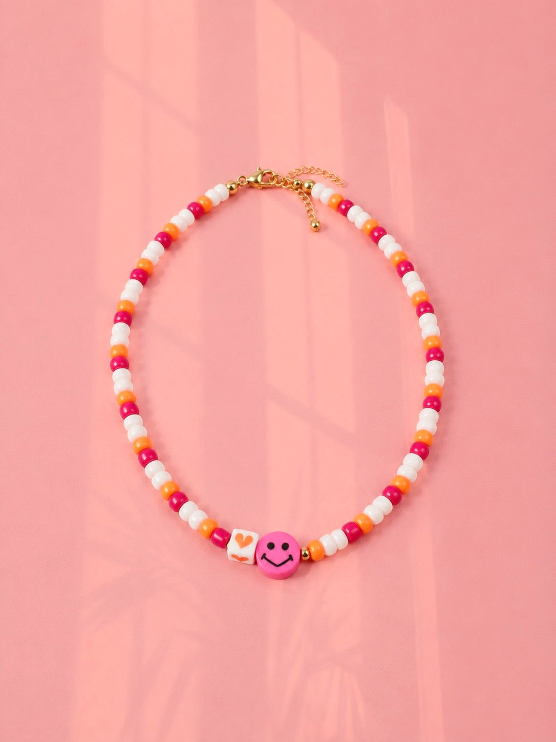 Fuschia smiley necklace