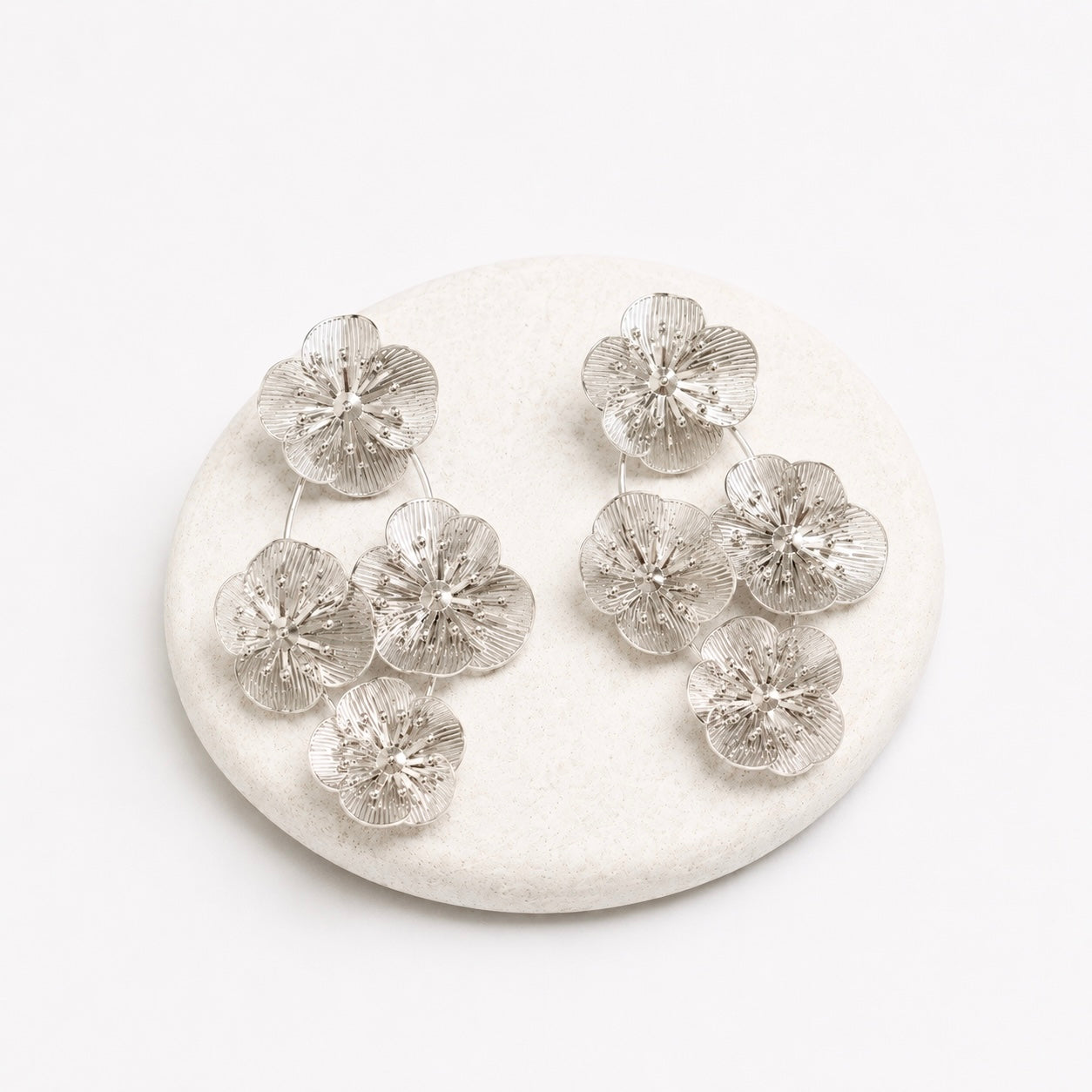 Oversized silver floral earrings