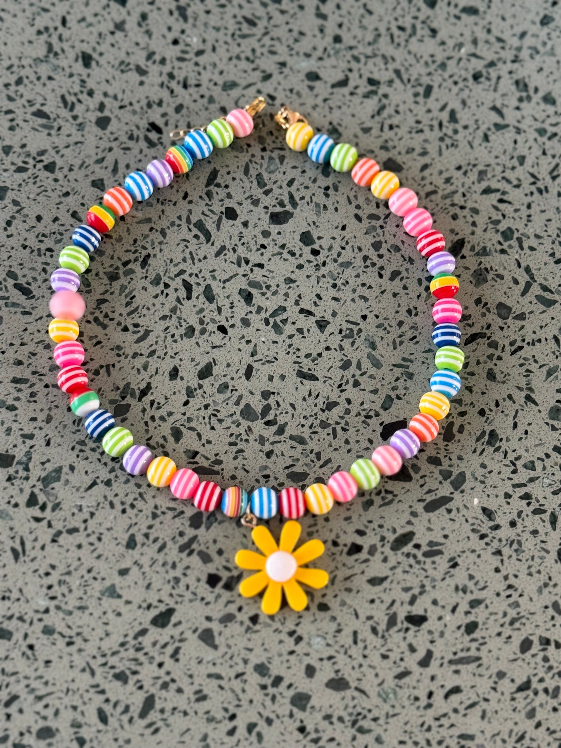 Kids rainbow yellow daisy necklace