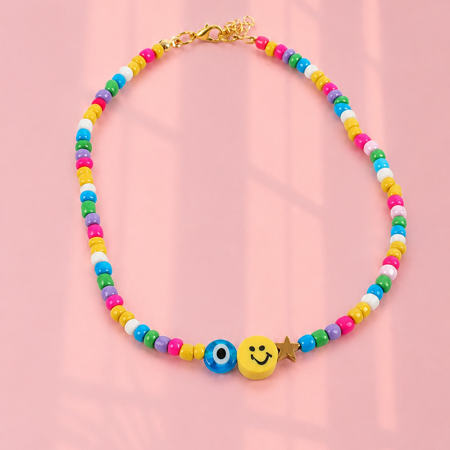 Yellow smiley / evil eye necklace