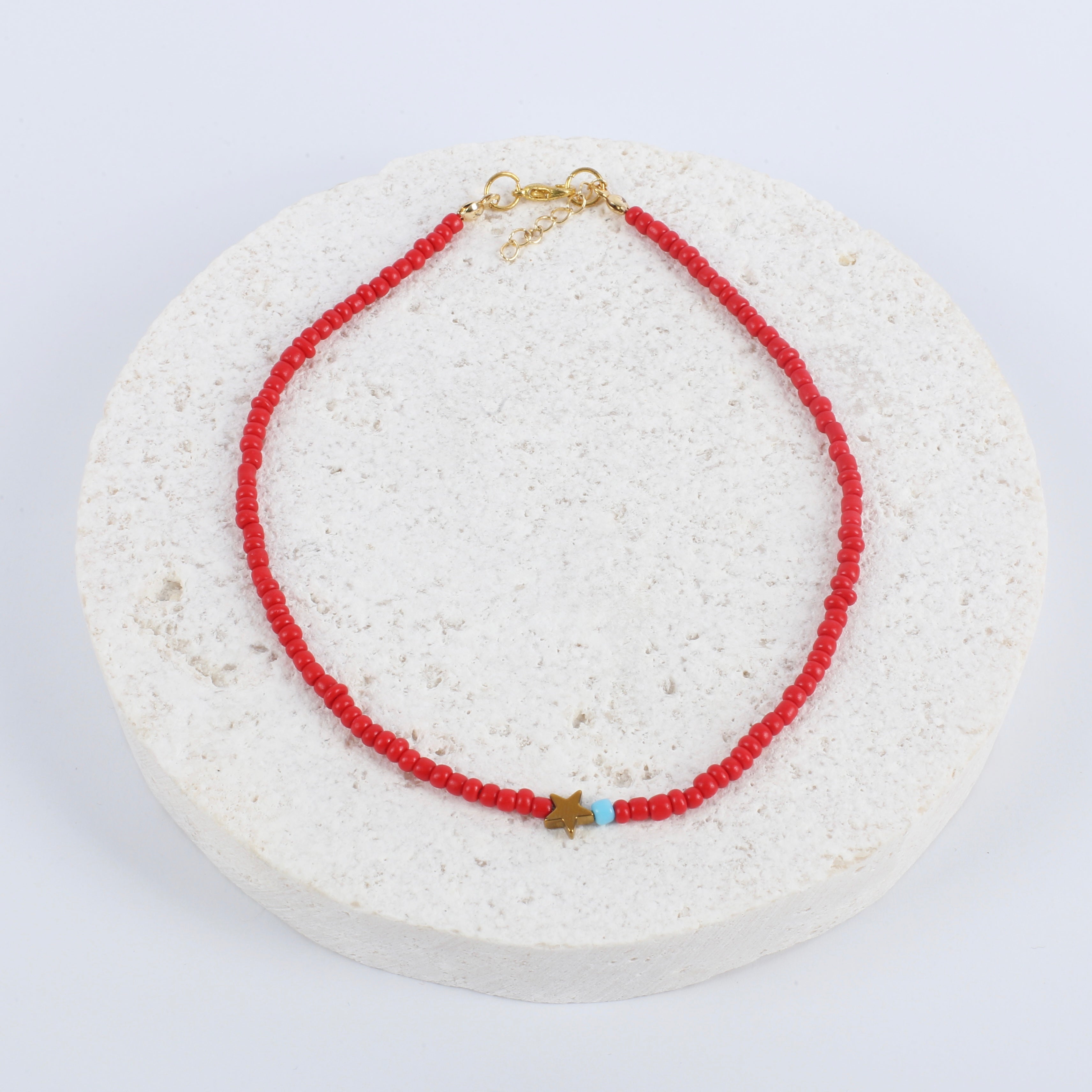 Delicate red starlight necklace
