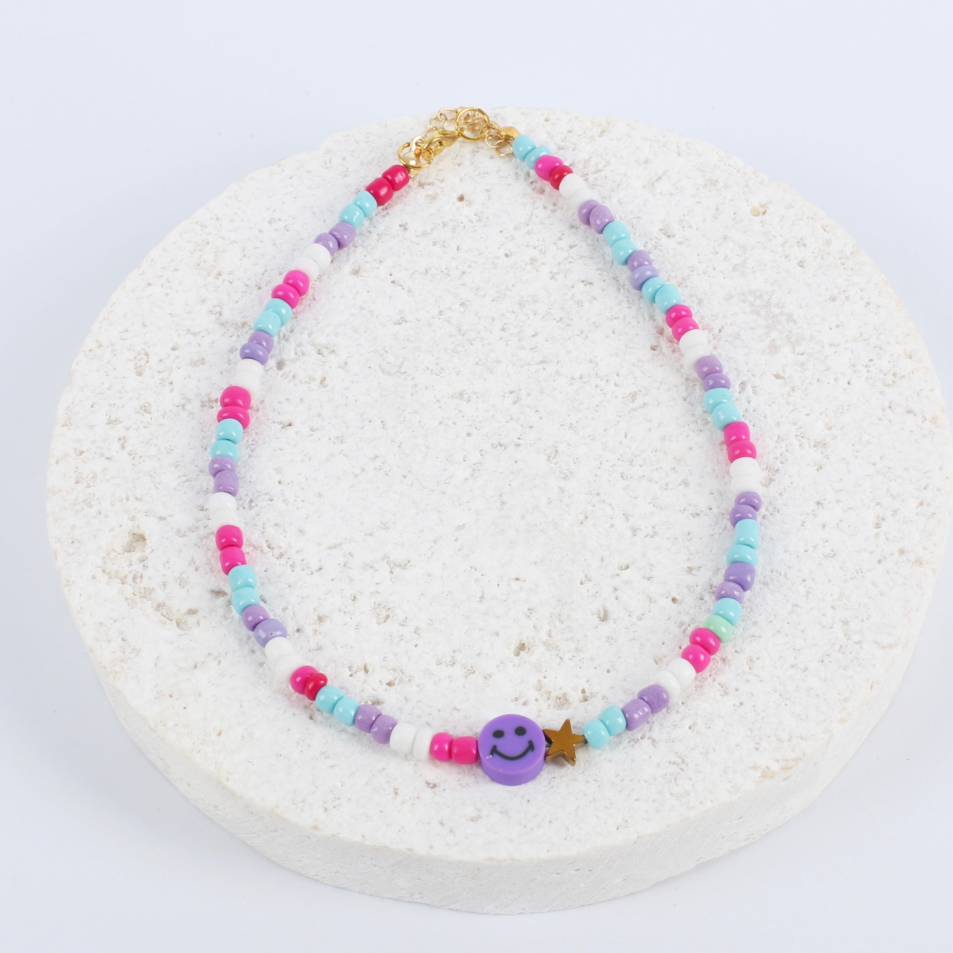 Purple smiley necklace